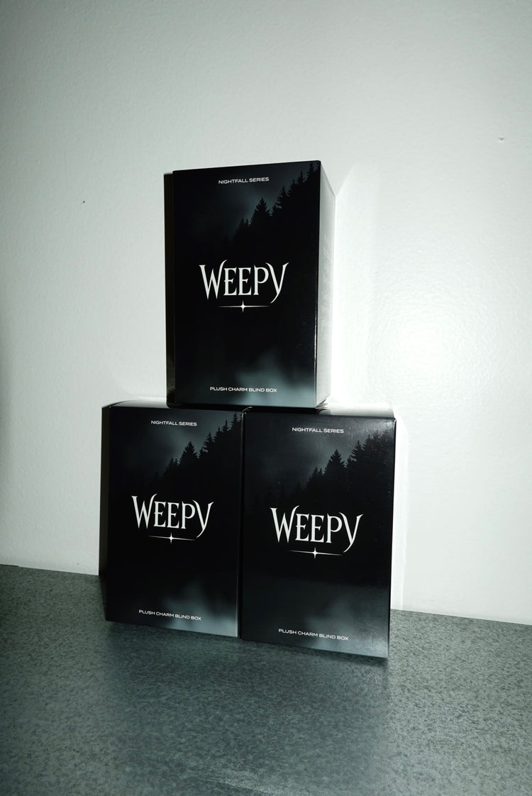 Three black Nightfall series blind boxes stacked in a pyramid