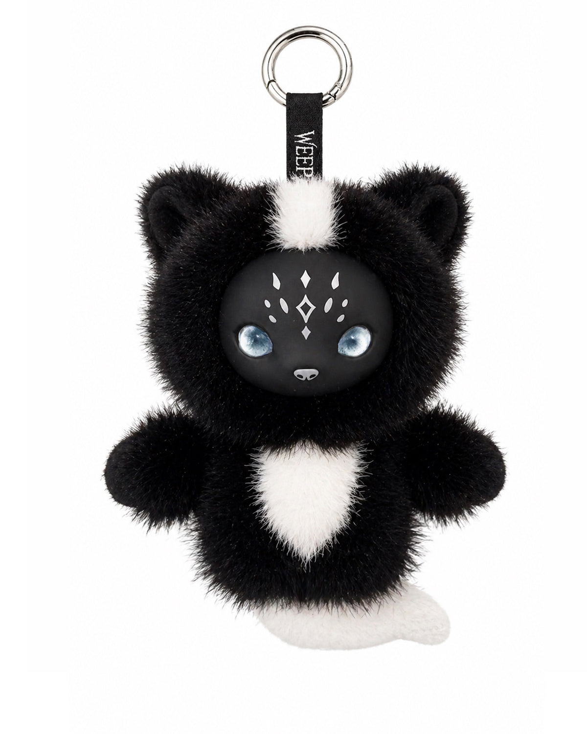 Black and white fluffy skunk plush charm keychain blue eyes on a white background